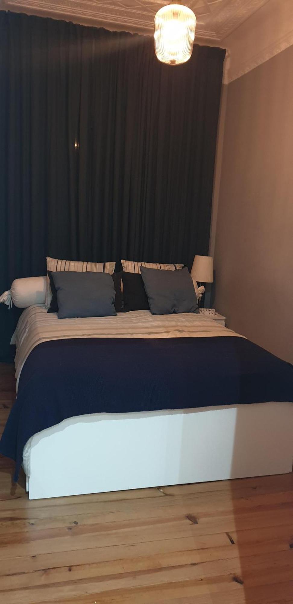 Quarto Aconchegante Com Janela E Vista Para Cidade Hospedagem domiciliar Lisboa